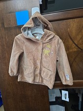6 to 9m brand new disney winnie, the pooh cardigan.Item 54G4