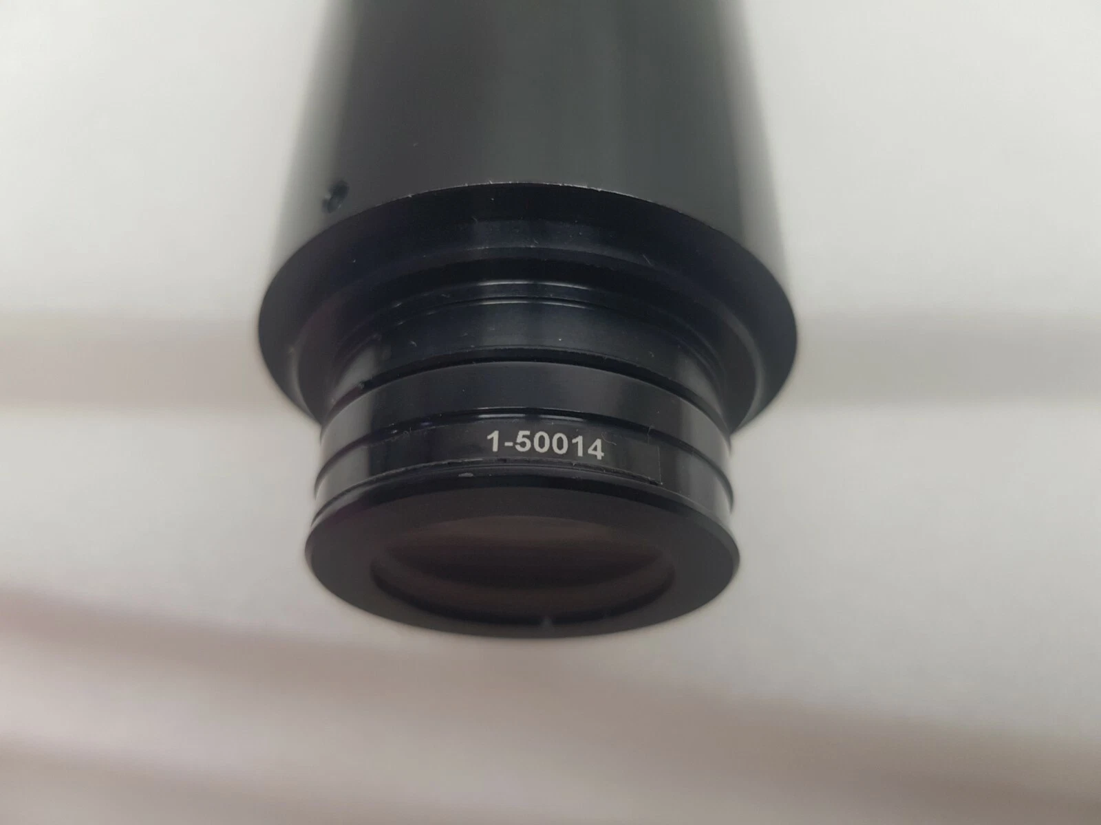Navitar 1-50014 1.5X lens attachment on the object end