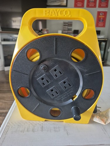 Bayco 755 25-Foot Cord Reel with 4 Outlets Yellow With Power Reset Button