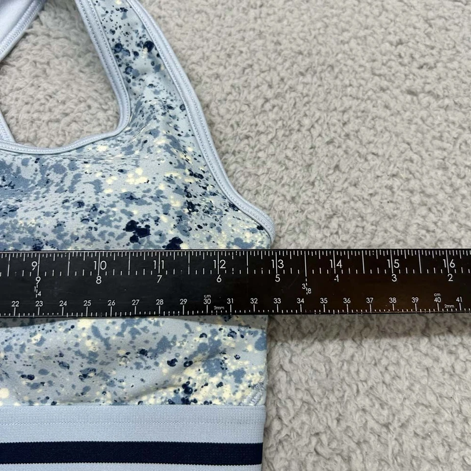 Sujetador deportivo mediano Under Armour Project Rock Foto 2 de 4