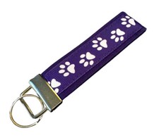 Purple Paw Print Key Chain, Dog Key Fob,Fabric Cat Keychain on Purple Background
