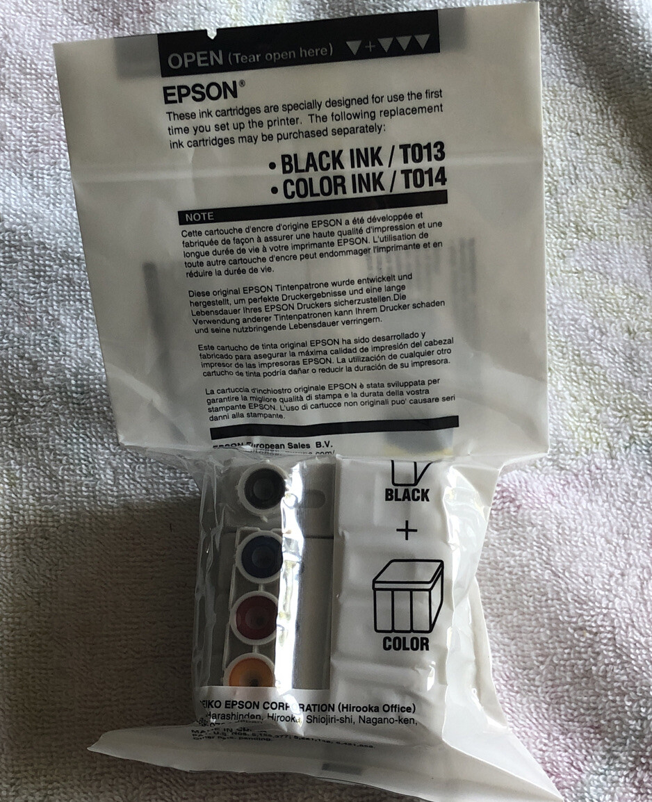 NEW OEM Epson Ink Cartridges For First Time Set Up. NEW AND SEALED IN PACKAGE