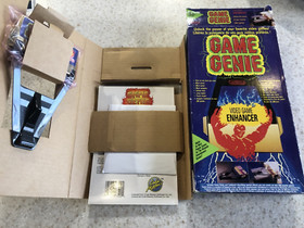 NINTENDO GAME GENIE VIDEO GAME ENHANCER COMPLETE BOX ORIGINAL NES NEW OPEN BOX