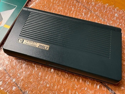 Vintage HP 200LX pocket PC DOS computer 2MB memory with manual fully tested ! - Afbeelding 8 van 13