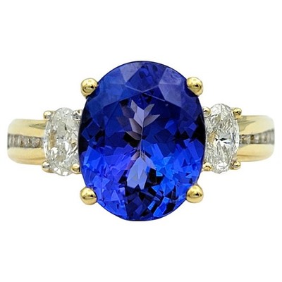 4.16 Carat Oval Cut Tanzanite Cocktail Ring with Diamonds 18 Karat Yellow Gold