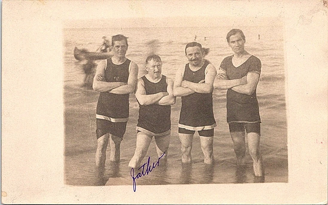 RPPC Studio Pose Four Men in Bathing Suits Ocean Props early 1900s
