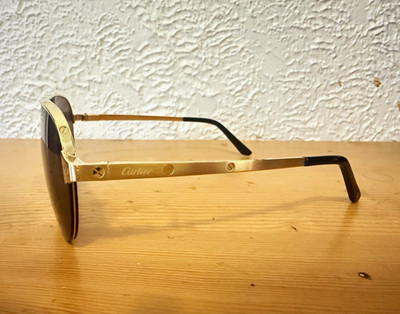 Cartier CT0386S 001 Aviator Sunglasses Gold Metal Frame Brown Tinted UV400