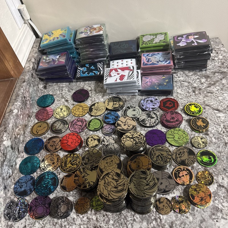 Pokemon Official Coin And Sleeve Lot x35 Sleeve Packs x239 Plastic Coins