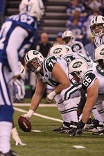 Center Nick Mangold New York Jets calls a play against the Indiana- 2009 Photo 1