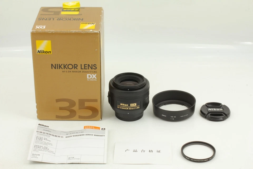 [COMO NUEVO] Lente Nikon 35 mm F/1,8G AF-S DX, capucha HB-46, tapa de Japón #622 Foto 2 de 4