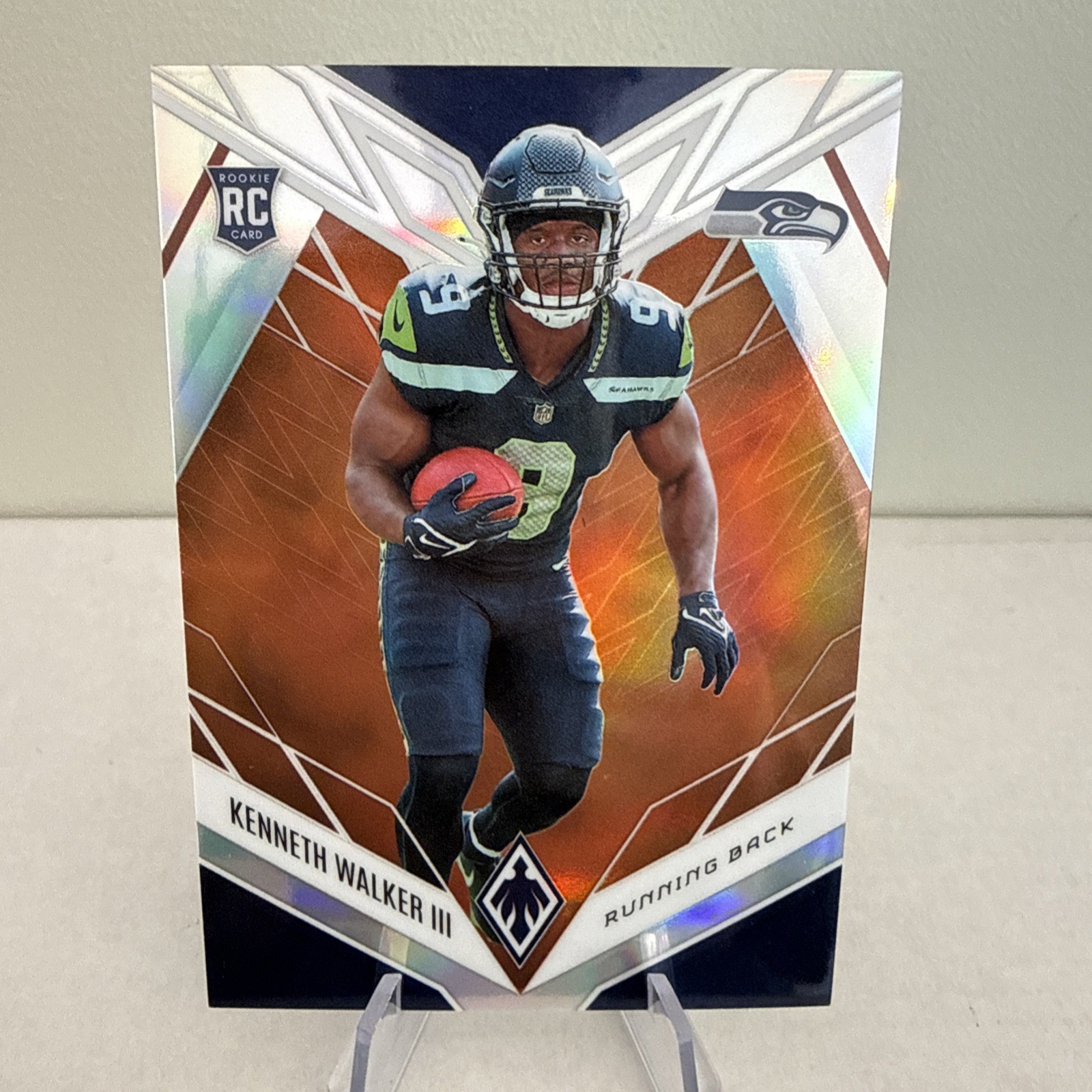 2022 Panini Phoenix - Rookies Kenneth Walker III #118 Orange /99 (RC)