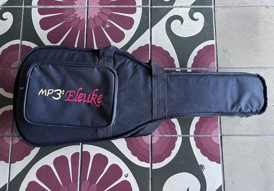 Ukelele Eleuke palo de rosa concierto jazz corte MP3 cuerpo sólido con bolsa acolchada Foto 3 de 4