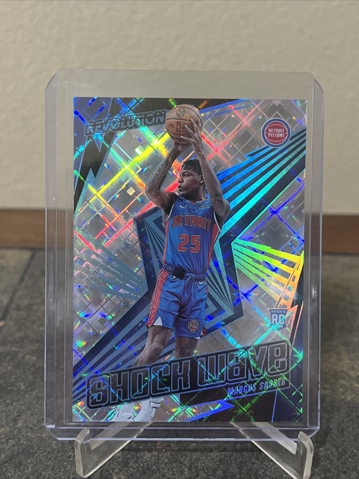 2023-24 Panini Revolution Marcus Sasser RC #18 Shock Wave Insert Cosmic /99 SP