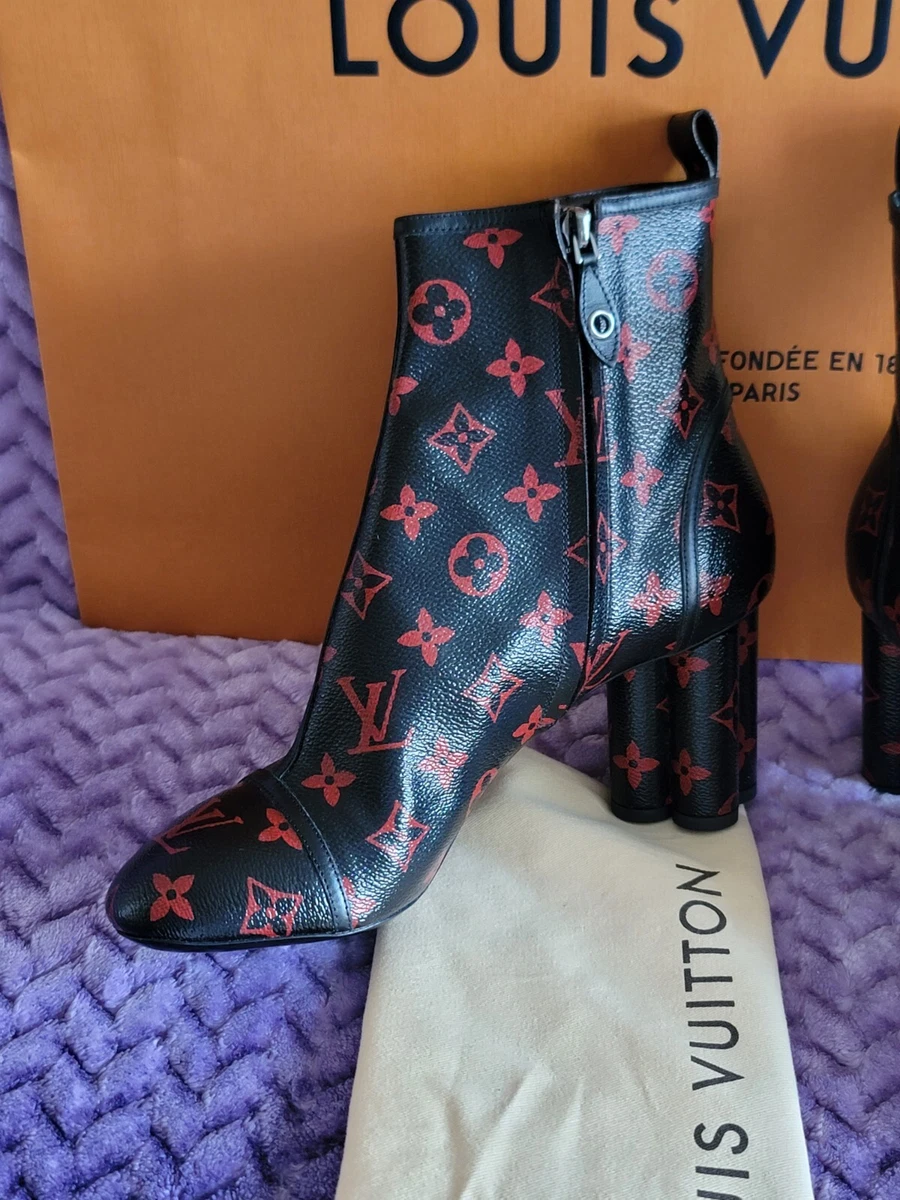 Louis Vuitton boots in red and black patent Monogram canvas