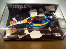 1/43 MINICHAMPS 433 950015 JORDAN PEUGEOT EJR195 1995 EDDIE IRVINE TOTAL EDITION