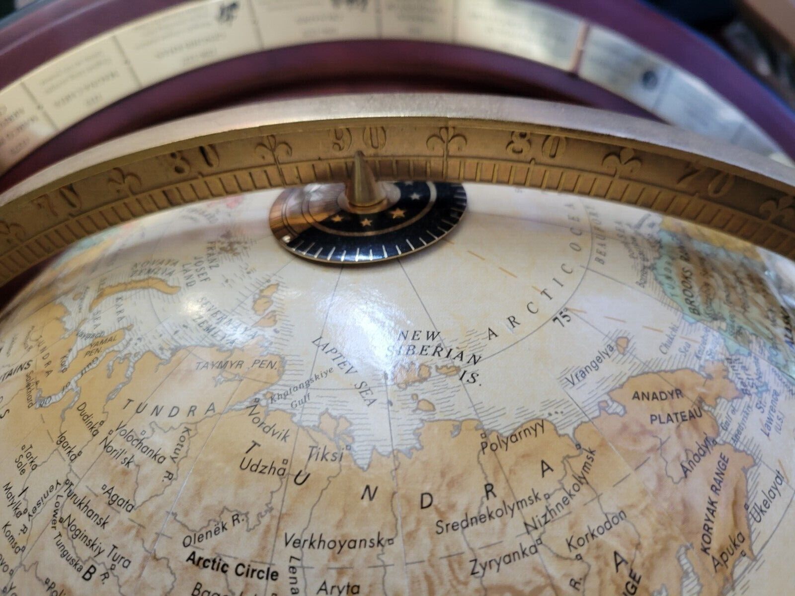 Sold at Auction: Royal geographical Society world globe on wooden