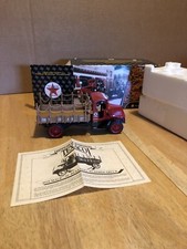 ERTL COLLECTIBLES 1:32 SCALE DIE CAST BANK 1918 MACK AC BULLDOG FLATBED TRUCK