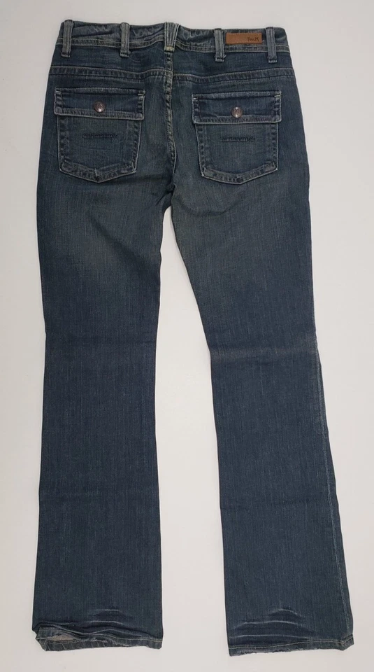 Pantalones de mezclilla Yanuk Worker clásicos para mujer talla 27 elásticos bootcut bolsillos con solapa Foto 2 de 4