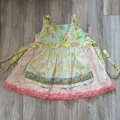 This is a Matilda Jane Girls Hello Lovely In The Meadow knot apron tunic Size 8
