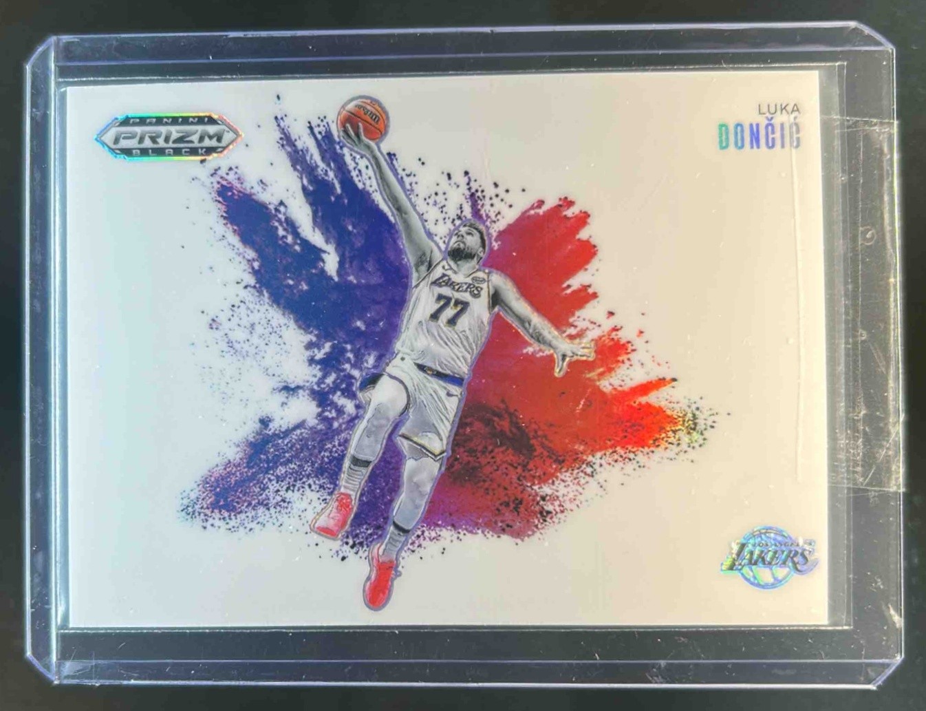 2024-25 Prizm Black Luka Doncic Color Blast #4 Lakers
