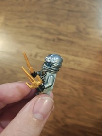 LEGO Ninjago Minifigure Silver Zane Titanium 2 Gold Sai Weapons 70748 As Is