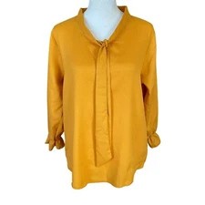 Women's mustard yellow long sleeve tie front ruffled blouse top