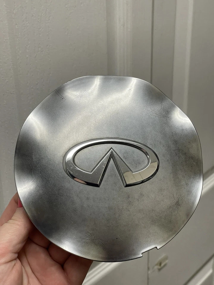 03 04 05 Tapa central de rueda Infiniti FX35 FX45 e Infiniti Q45 2005 40315-CG010 OEM Foto 2 de 4