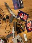 nes game and accessory lot vintage game genie zapper max bubble bobble and more