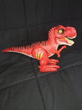Red T-Rex Dinosaur Toy. Electronic Walking Light Up Sound Figure