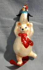 CUTE SNOWBOARDING POLAR BEAR AND PENGUIN IN SANTA HAT GLASS ORNAMENT 6"