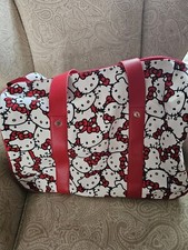 NEW Hello Kitty All-Over Print Rolling Duffle Bag