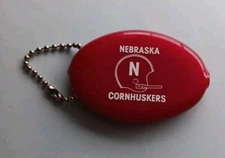 Vintage NEBRASKA CORNHUSKERS Rubber Coin Keeper Key Chain QUIKOIN