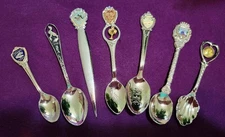Seven (7)  CALIFORNIA AND OREGON ATTRACTIONS MINIATURE COLLECTOR SPOONS