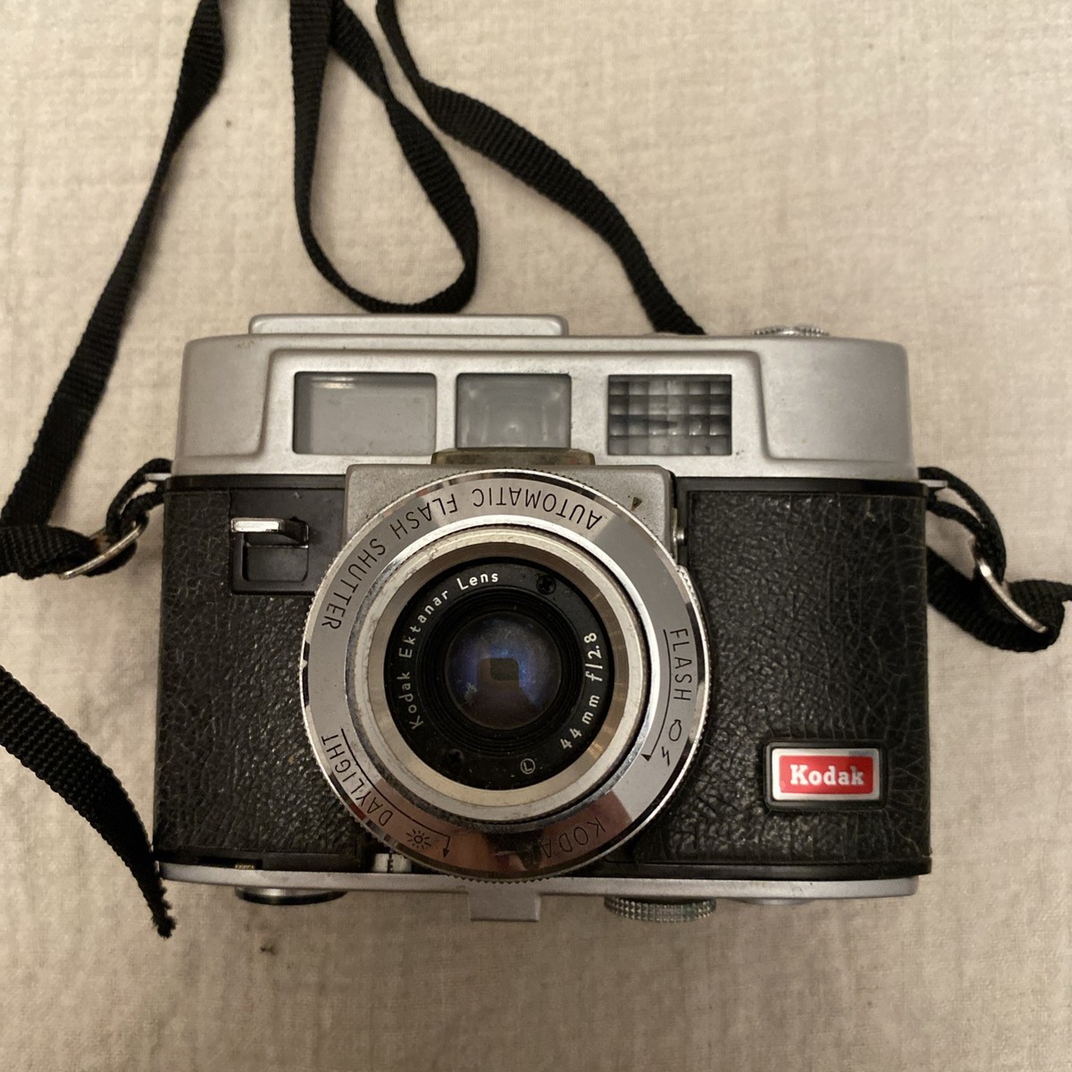 Kodak Automatic 35F Camera With Box And Sylviania Flashbulbs