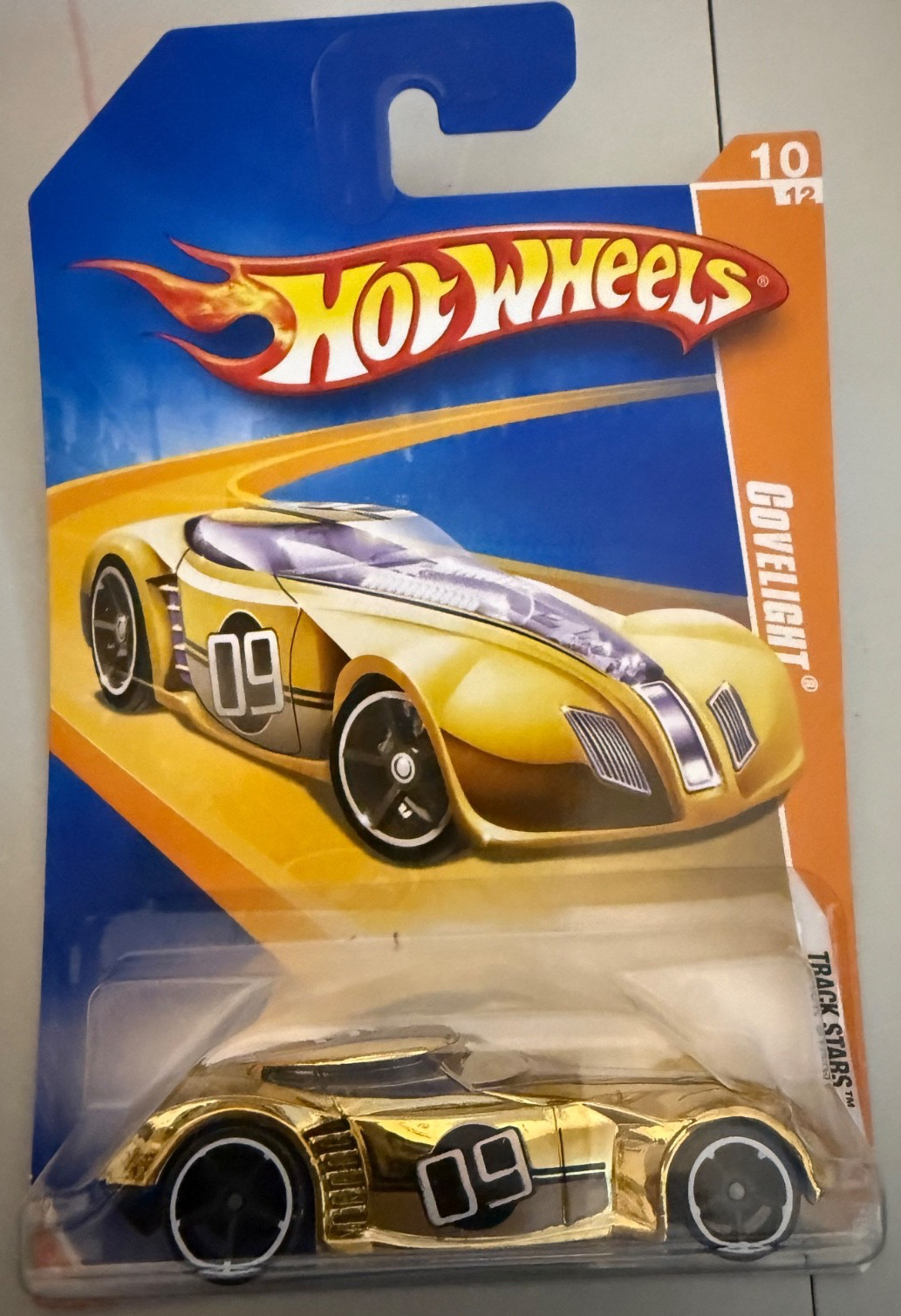 2009 1:64 Hot Wheels Track Stars 10/12 Covelight Gold Chrome 064/190