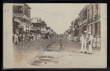 RPPC Postcard Colon, Panama. US Navy Sailors Main Street View c1920