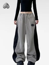 Moose Knuckles men's and women's casual straight leg work pants with wide legs