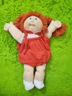 Vintage Cabbage Patch Doll, Red Hair Blue Eyes Red Tie Shoulder Dress 1983