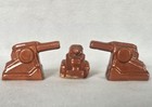 Three Niloak Pottery Shakers Tank & Pair Cannons Unmarked Unknown Age — photo 1