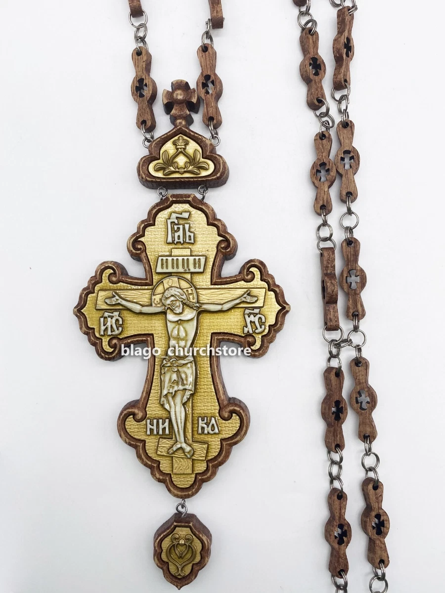 Croce ortodossa stilizzata in bronzo lucido con decorazioni. Real Votiva Store