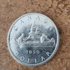 1959 uncirculated Canadian 80% silver dollar