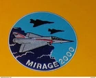 PATCH FABRIC: MIRAGE 2000, AIR FORCE WITH LIGHT BLUE BACKGROUND, DIAMETER 9 CM