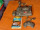 VINTAGE SEGA GENESIS CONSOLE MODEL 1601 AUTO RF SWITCH, POWER CORD, CABLES, BOOK
