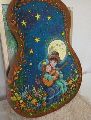 A painting created on a piece of old, broken guitar. Acrylic and wood paints.
