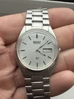 A Vintage Mens Seiko SQ Day/Date Quartz Wristwatch