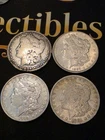 Lot Of 4 morgan silver dollars!