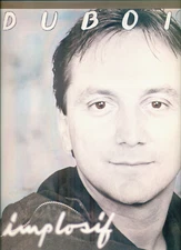 1 LP (M/NM) CLAUDE DUBOIS – IMPLOSIF – POCHETTE AVEC AUTOGRAPHE ET DÉDICACE