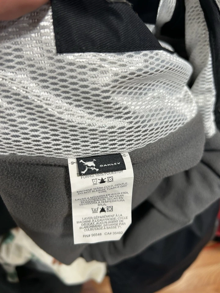 Pantalones negros Oakley pierna ancha esquí Recco Ascertain talla mediana baberos a prueba de agua raros Foto 3 de 4