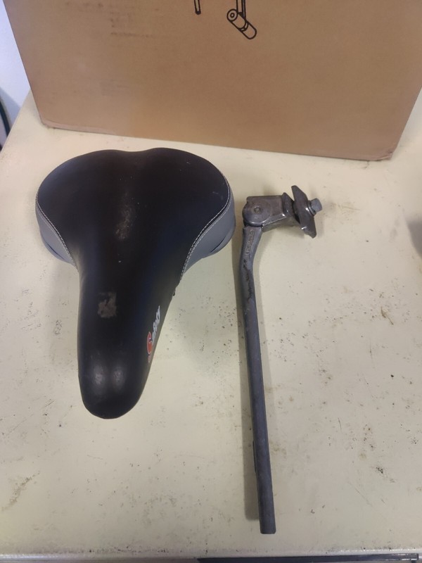 Bike Seat - Color Black. Condition - never used. With Used Lot Lock stand