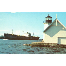 Vintage Sunken Rock Lighthouse Large Ship Passing St Lawrence River NY Postcard